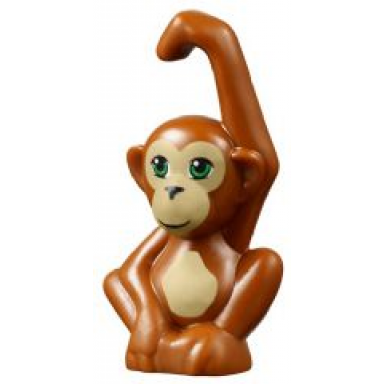 dark orange monkey orangutan friends baby with bright green eyes black nose and dark tan face and stomach pattern