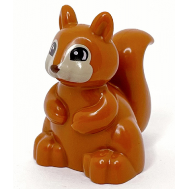 duplo squirrel with tan face black and white eyes and reddish brown nose pattern