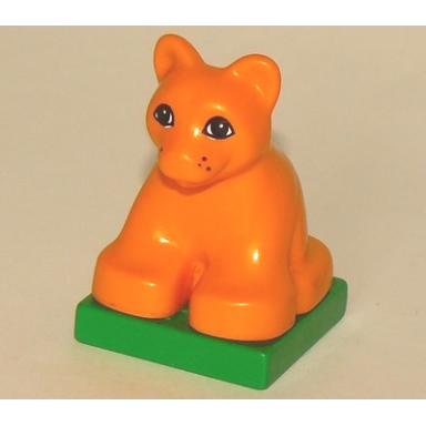 medium orange duplo lion baby cub on green base