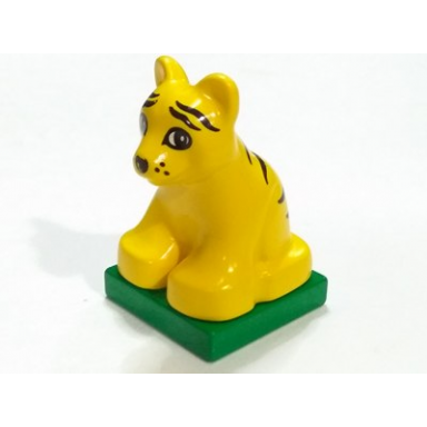 yellow duplo tiger baby cub on green base