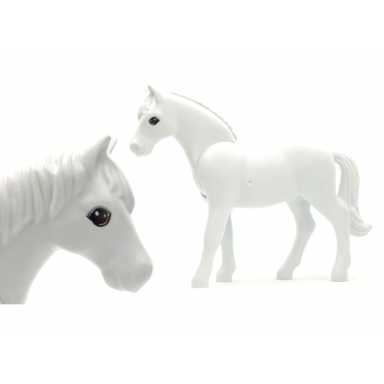 very light bluish gray horse belville with large round eyes with light gray top and dark orange bottom eyelids small glints pattern