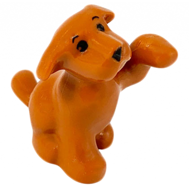 dark orange dog belville sitting with raised paw with black eyes eyebrows and nose pattern