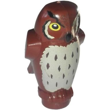 reddish brown owl angular features with black beak yellow eyes and tan chest feathers pattern hp pigwidgeon