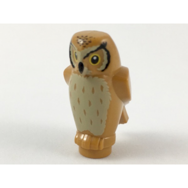 medium nougat owl angular features with black beak and forehead spots yellow eyes and tan chest feathers pattern