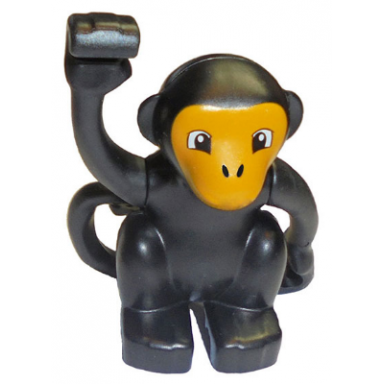 black duplo monkey curled tail turned to side with bright light orange face pattern