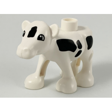 white duplo cow baby calf walking black spots eyes semicircular pattern