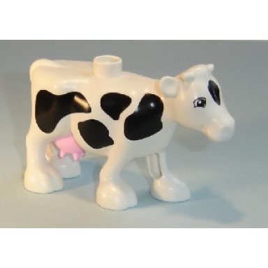 white duplo cow adult walking black spots bright pink udder