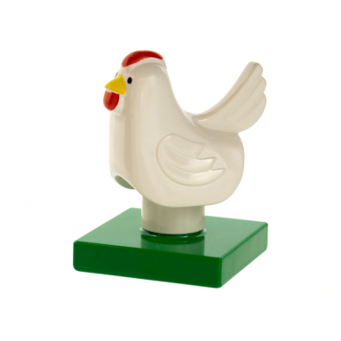 white duplo chicken hen eyes front on green base