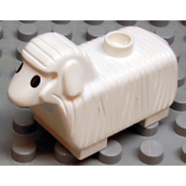 white duplo sheep with flat ears black eyes pattern