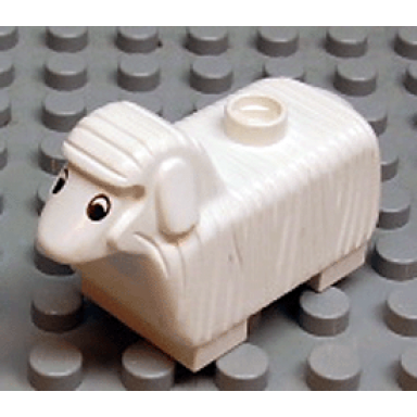 white duplo sheep with flat ears black and white eyes pattern