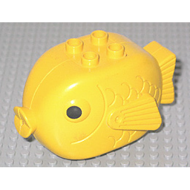 yellow duplo fish with 4 studs on top and black eyes pattern