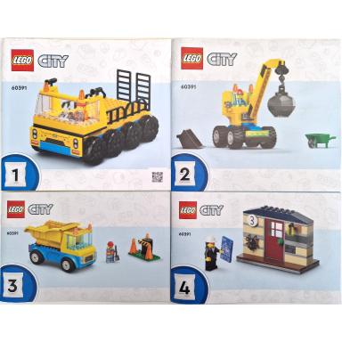 construction trucks and wrecking ball crane