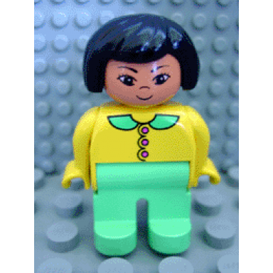 duplo figure female light green legs yellow blouse with light green collar and dark pink buttons black hair grin