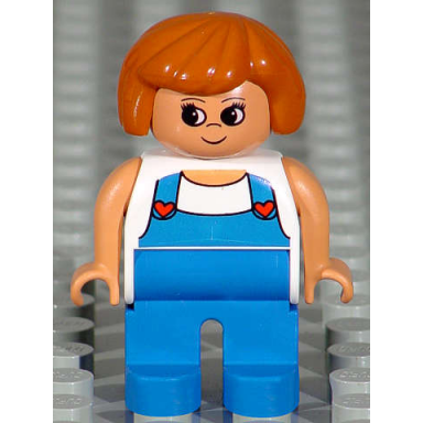duplo figure female blue legs white top with blue overalls with red hearts