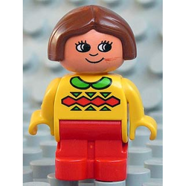 duplo figure child type 1 girl red legs yellow top with green collar brown hair
