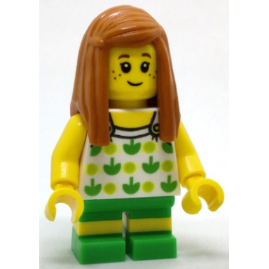 child - girl white halter top with green apples and lime spots bright green short legs with molded yellow stripes dark orange long hair freckles
