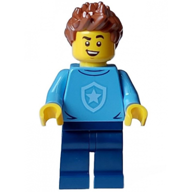 police - city officer in training male medium blue shirt with badge dark blue legs reddish brown hair open mouth smile