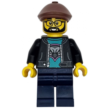 race truck driver - male black jacket over dark turquoise shirt with hawk head logo dark blue legs reddish brown flat cap beard glasses