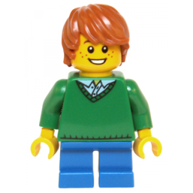 child - boy green v-neck sweater blue short legs dark orange tousled hair freckles