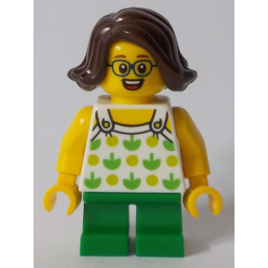 child - girl white halter top with green apples and lime spots green short legs dark brown hair glasses
