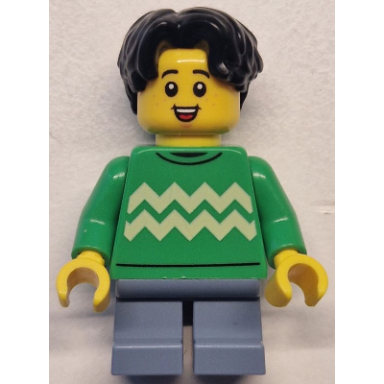 child - boy bright green sweater with bright light yellow zigzag lines sand blue short legs black hair wavy freckles
