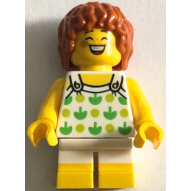 child - girl white halter top with green apples and lime spots white short legs with yellow feet dark orange hair