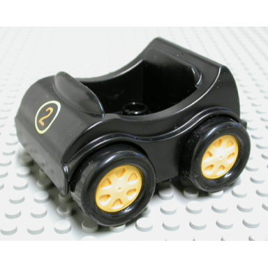 black duplo car with molded yellow wheels and black smooth tires with yellow number 2 in circle pattern
