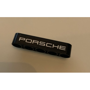 black technic liftarm thick 1 x 5 with white porsche on black background pattern sticker - set 42096