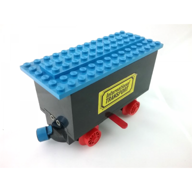 black train battery box car with two contact holes red switch lever blue and red magnets red wheels and blue roof with international transport pattern on both sides stickers - sets 161 181-1 183