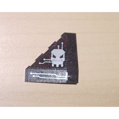 black wedge 4 x 4 slope 18 corner with silver and dark red circuitry and skull pattern stickers - set 7702