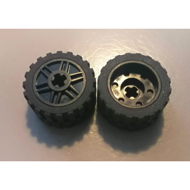 black wheel 18mm d x 14mm with axle hole fake bolts and shallow spokes with black tire 24 x 14 shallow tread - band around center of tread 55982 89201