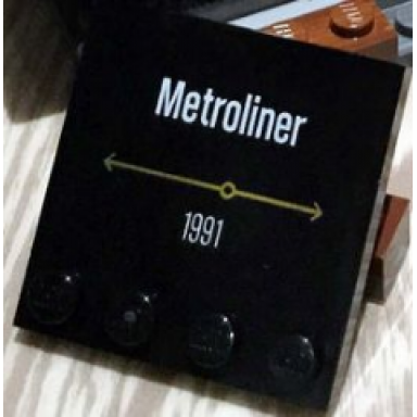 black tile modified 4 x 4 with studs on edge with metroliner 1991 pattern