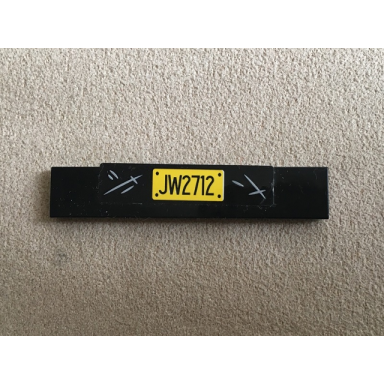 black tile 1 x 6 with yellow jw2712 pattern sticker - set 75926