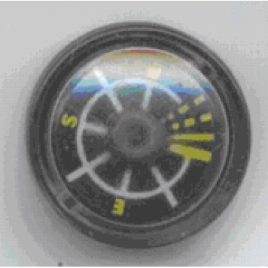 black minifigure utensil compass with fixed trans-clear top and black disc with white and yellow lines pattern