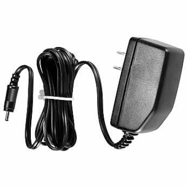 black electric power adapter transformer input: 120v ac output: 10v dc