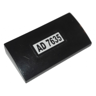 black slope curved 2 x 4 x 2 3 with bottom tubes with ad 7635 pattern sticker - set 7635