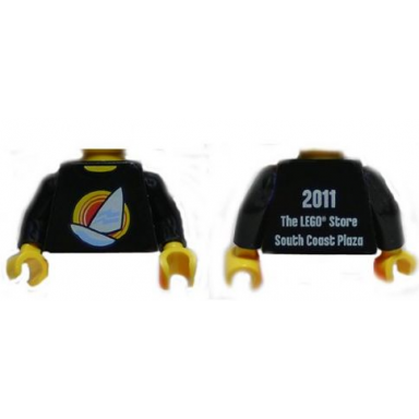 black torso shirt with white sailboat over red concentric circles sun yellow neck 2011 the lego store south coast plaza on back pattern black arms yellow hands