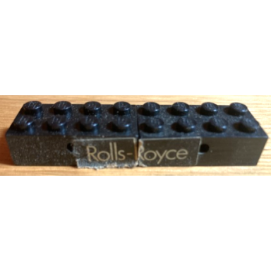 black stickered assembly 8 x 2 x 1 with rolls-royce pattern sticker - set 395-1 - 2 brick modified 2 x 4 with wheels holder trans-clear bottom