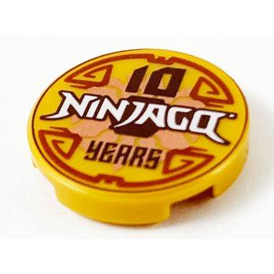 pearl gold tile round 2 x 2 with bottom stud holder with 10 ninjago years pattern