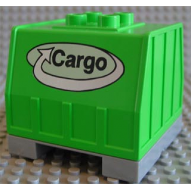 bright green duplo train freight container on pearl light gray palette with black cargo on white oval with silver curved arrow pattern on both sides