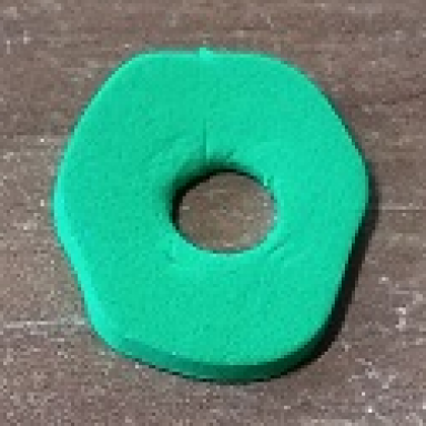 bright green foam scala lettuce for sandwich with hole