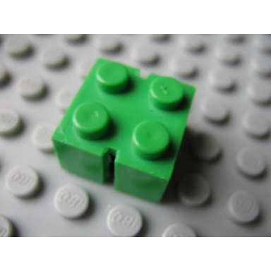 bright green brick 2 x 2 without bottom tubes slotted with 2 slots opposite