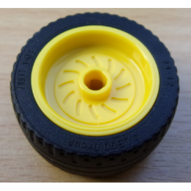 yellow wheel 18mm d x 12mm with axle hole and stud with black tire 24 x 12 low 18976 18977