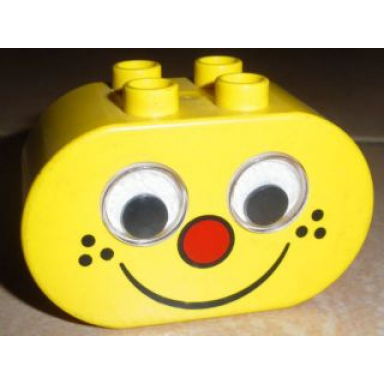 yellow duplo brick 2 x 4 x 2 rounded ends rattling eyes with red nose and black freckles and smile pattern