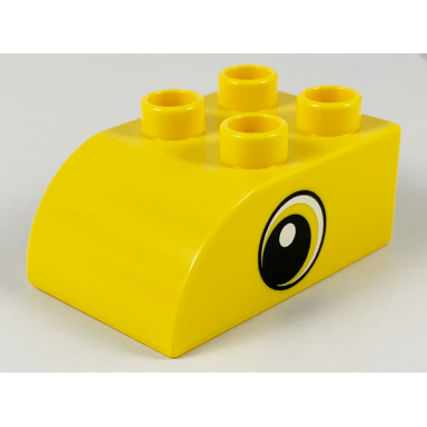 yellow duplo brick 2 x 3 slope curved with circled black eye with crescent and white pupil pattern on both sides