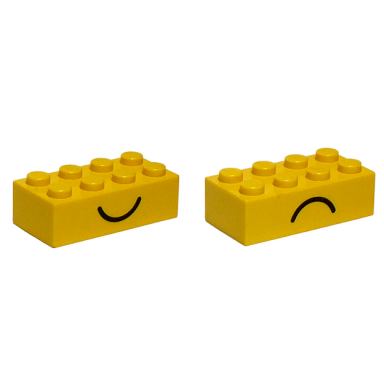 yellow brick 2 x 4 with smile and frown pattern on opposite sides