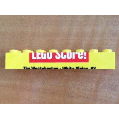 yellow brick 2 x 8 with bottom half of lego store! pattern