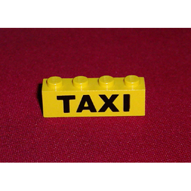 yellow brick 1 x 4 with black taxi pattern