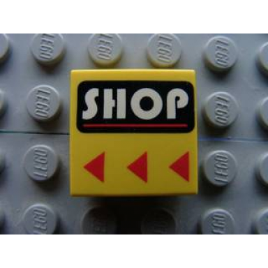 yellow tile 2 x 2 with white shop and red line on black rounded rectangle red triangles pattern