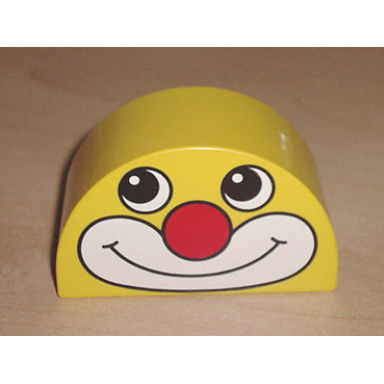 yellow duplo brick 2 x 4 x 2 slope curved double with clown face pattern
